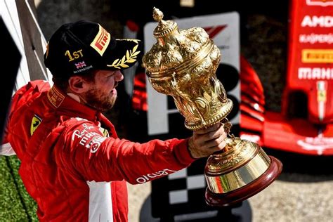 Nice Shot Of Sebastian Vettel With His Win Trophy On The Podium 🏆