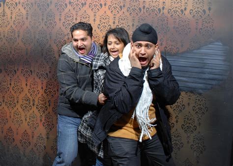Scared People In A Haunted House Attraction