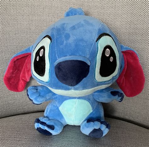 Stich Bebé De Peluche Azul 28 Cm Complemento A Tus Flores Envíos