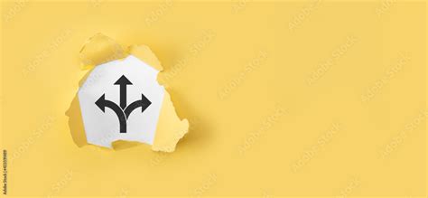 Torn Yellow Paper With Tree Direction Icon On White Background In Doubt