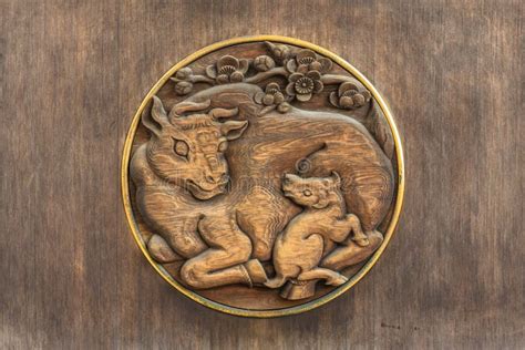 Plum Trees And Oxen Engraving On The Wooden Door Of The Yushima