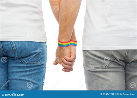 Male Couple With Gay Pride Rainbow Wristbands Stock Photo Image Of