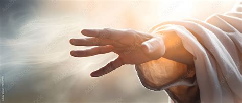 Jesus Christ Extending His Hand In A Warm Environment Trying To Help