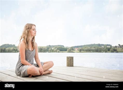 Woman Crossed Legs Hi Res Stock Photography And Images Alamy