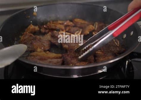 Cooking La Galbi Korean Bbq Short Ribs On A Fying Pan Well Done Beef