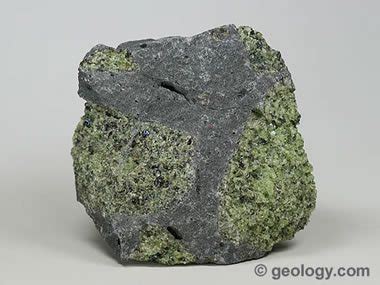 Olivine: A rock-forming mineral. Used as the gemstone peridot.