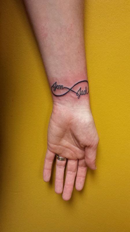 Love Tattoo Infinity Tattoo Name Tattoos Couple S Tattoo Done By Eric Married Rings Tattoo