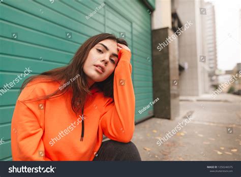 Street Portrait Stylish Girl Orange Hoodie Stock Photo 1250246575