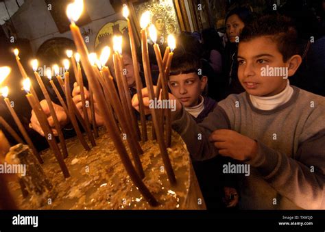 Palestinian Christians Light Candles On The Second Sunday Of Advent In