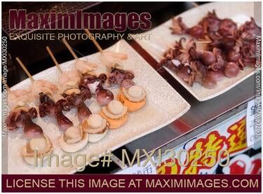 Photo Of Japanese Street Food Grilled Seafood Skewers With Scallop And