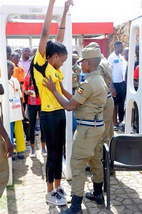 See New Photos Of Ugandan Police Carrying Out A Bomb Search On Women