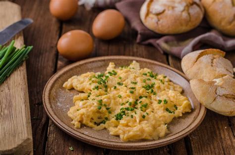 Scrambled eggs with herbs stock image. Image of omelet - 102883087