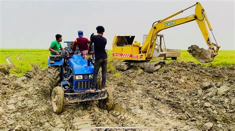 Jcb Dx Loading Mahindra Tractor Stuck In Mud Sonalika Tractor