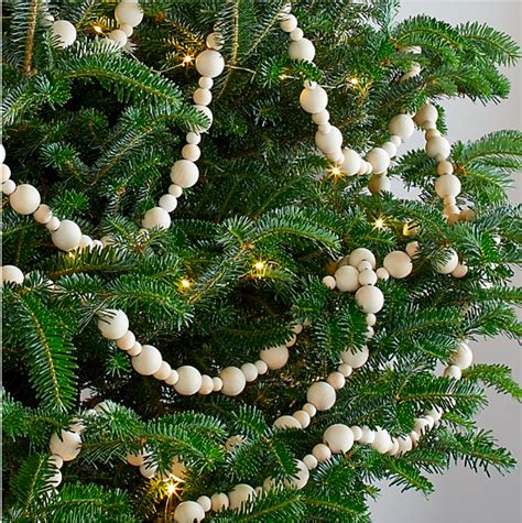 How To Make A Wood Bead Garland Bead Garland Christmas Tree Christmas Garland Diy Christmas