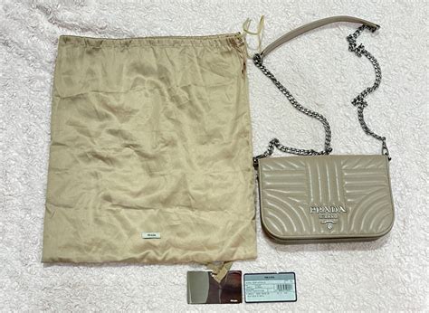 Prada Nappa Impunture Cross Body Bag Diagramme In Nude Or Powder Color Luxury Bags Wallets