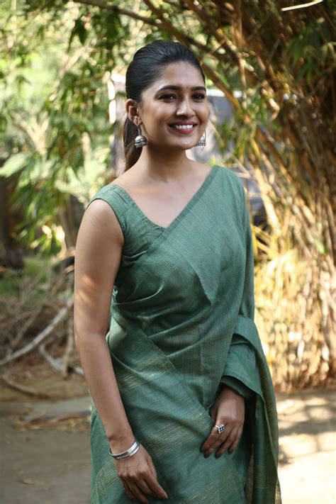 Vani Bhojan Saree Stills at Oh My Kadavule Success meet - RitzyStar