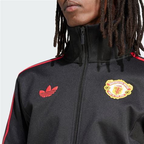 Clothing - Manchester United Stone Roses Originals Track Top - Black | adidas Oman