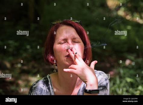 Mature Woman Smoking Cigarette Hi Res Stock Photography And Images Alamy