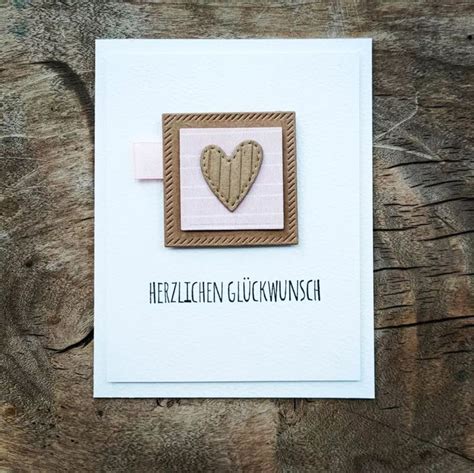 A Card With A Heart On It And The Words Herzligen Gluchwuinsch