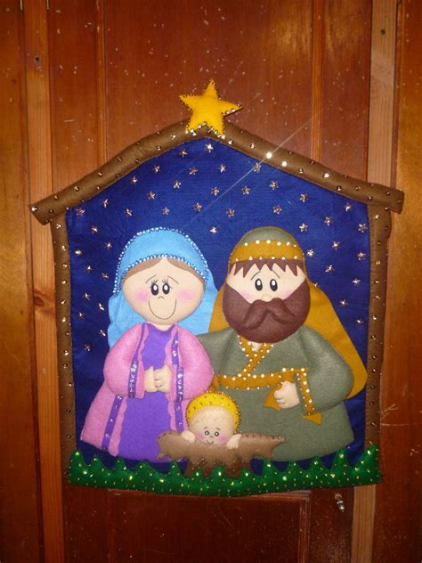 A Nativity Scene Is Hanging On The Door