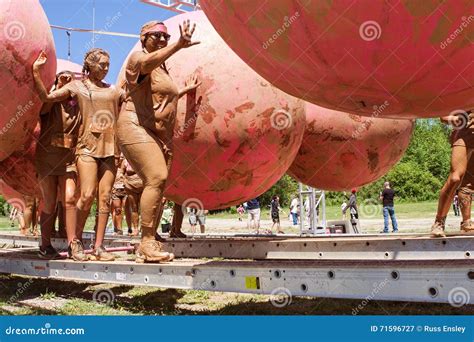 Women In Mud Pit On Obstacle Course Editorial Image Cartoondealer