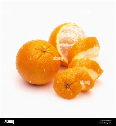 Whole Orange And Half Peeled Orange Stock Photo Alamy