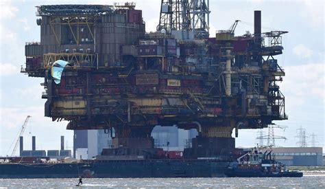 Oil rig being floated down a river for decommissioning : r/AbandonedPorn