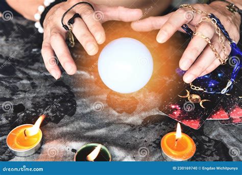 Show Fortune Tellers Of Hands Holding Tarot Cards And Tarot Reader With