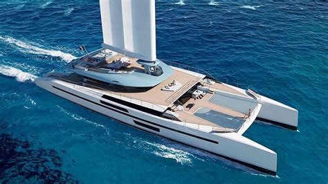 a large white boat floating on top of the ocean next to a tall tower ...