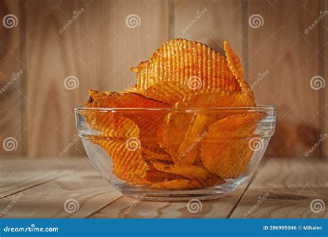 Transparent Glass Bowl Of Potato Chips With Paprika Stock Photo Image