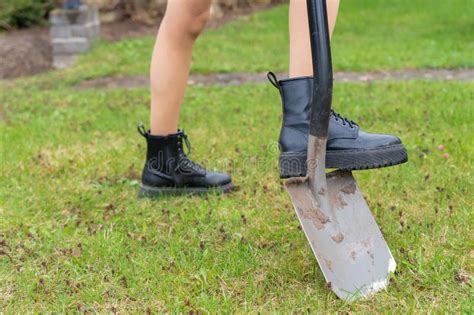 Black Boots And A Shovel On A Green Grass Stock Image Image Of Spade