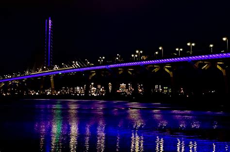 Montreal S Samuel De Champlain Bridge Lit Up In Purple To Mark National