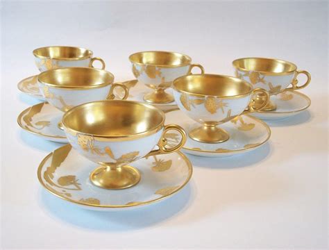 Continental Gilt Porcelain Cups And Saucers Hand Painted Signed 20th