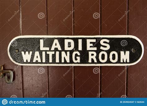 A Vintage Cast Iron Ladies Waiting Room Sign. Stock Image - Image of ...