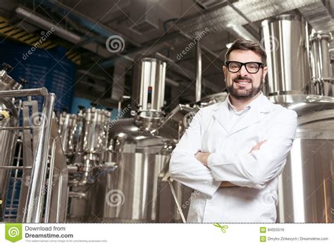 Smiling Man Posing With Brewing Mechanisms Stock Photo Image Of