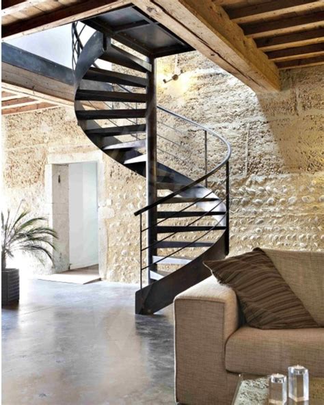 Black Metal Spiral Staircase Contrasts With Light Textured Walls Loft Conversion Staircase