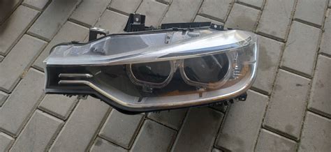 K LAMPA LEWY PRZÓD BMW 3 F30 F31 BI XENON TYC EU 63117259525 aa za 650