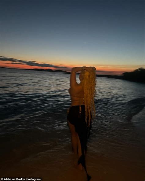 Alabama Barker Showcases Her Curves In Skimpy Patterned Bikini And Sarong While On Beach