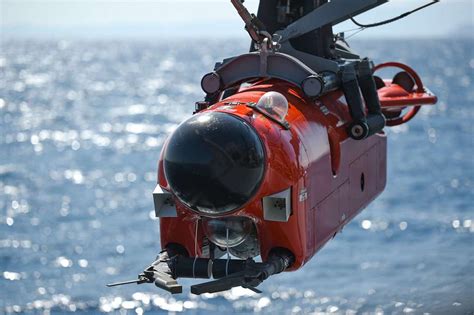 A Mine Neutralizing Vehicle Mnv Is Lowered Into The Water During