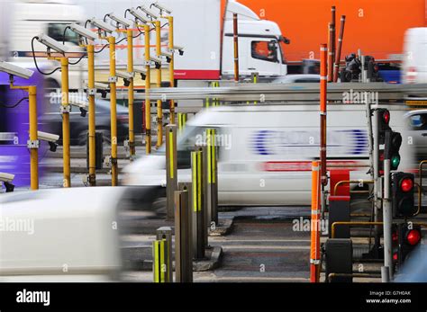 Traffic Passes Through The Tolls At The Dartford Crossing In Kent As