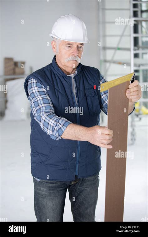 Mature Contractor Working Stock Photo Alamy