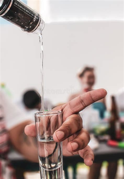 Upright Image Hand Holding Tequila Glass Person Serving Tequila In A