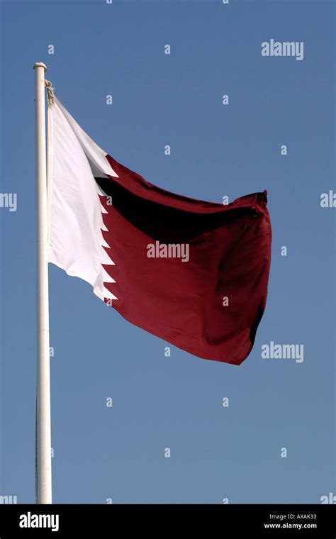 The Qatari flag Stock Photo - Alamy