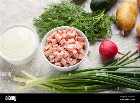 Different ingredients for okroshka on light background Stock Photo - Alamy