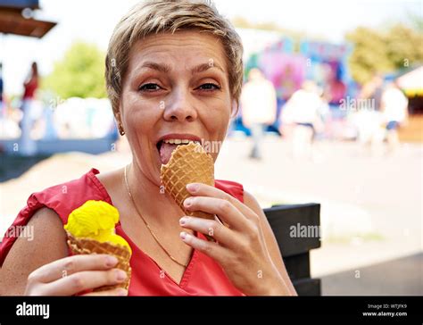 Woman Eating Ice Cream Hi Res Stock Photography And Images Alamy