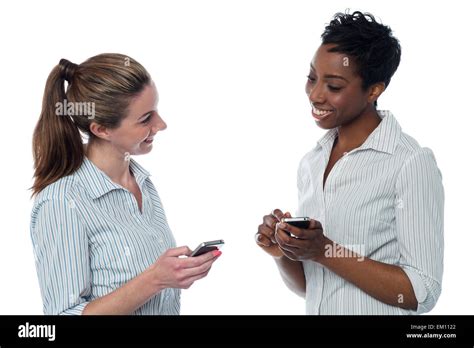 Two Corporate Women Having A Discussion Stock Photo Alamy