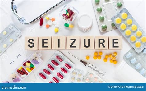 Seizure Word On Wooden Blocks On A Desk Medical Concept With Pills