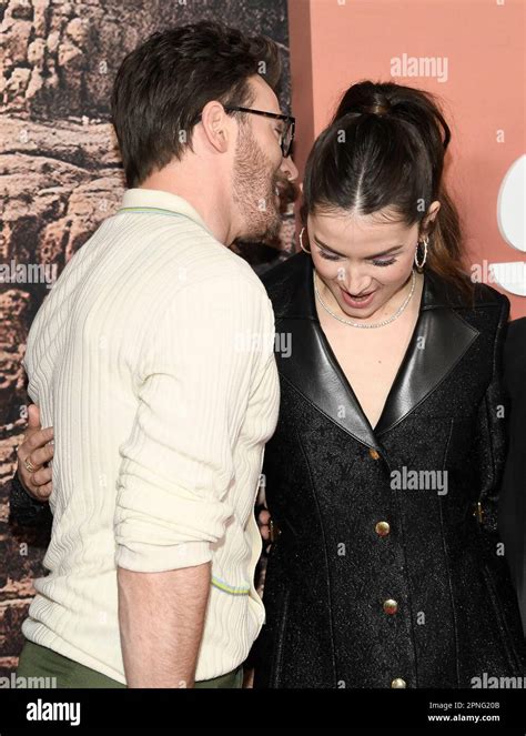 Chris Evans Left And Ana De Armas Attend The Premiere Of Apple