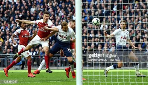 Arsenals Shkodran Mustafi Fouls Tottenham Hotspurs Harry Kane In