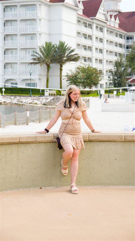 A Beautiful Woman Walking on Sidewalk · Free Stock Photo